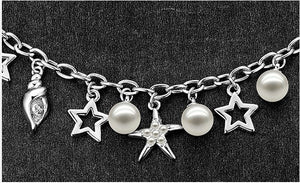 CDE Glass pearl bracelet with rhodium plating embellished with Swarovski crystals